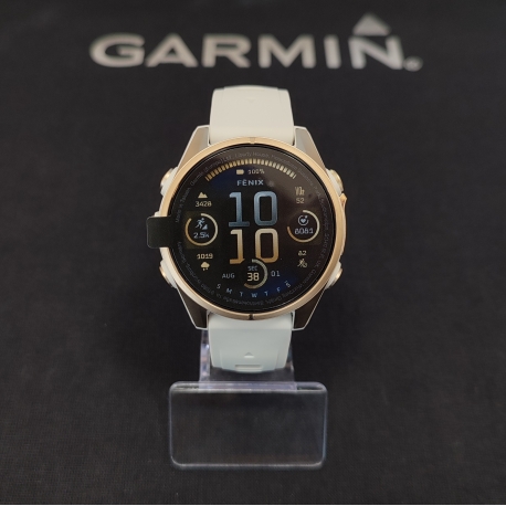Fenix 8 43 mm AMOLED Sapphire Soft gold z piaskowo-beżowym paskiem