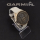 Fenix 8 43 mm AMOLED Sapphire Soft gold z piaskowo-beżowym paskiem