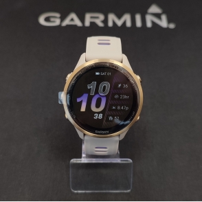 Forerunner 970 Tytanowy w kolorze soft gold z paskiem w kolorze french grey/indygo